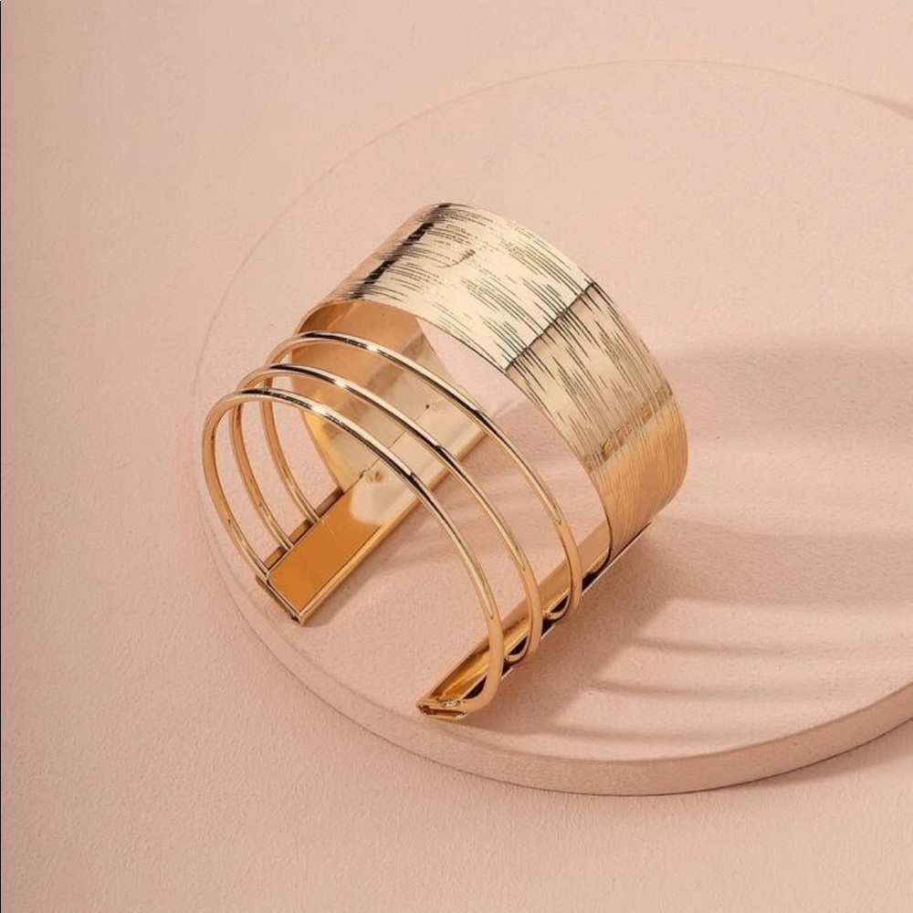 Gold Cuff Bangle with hollow cutouts